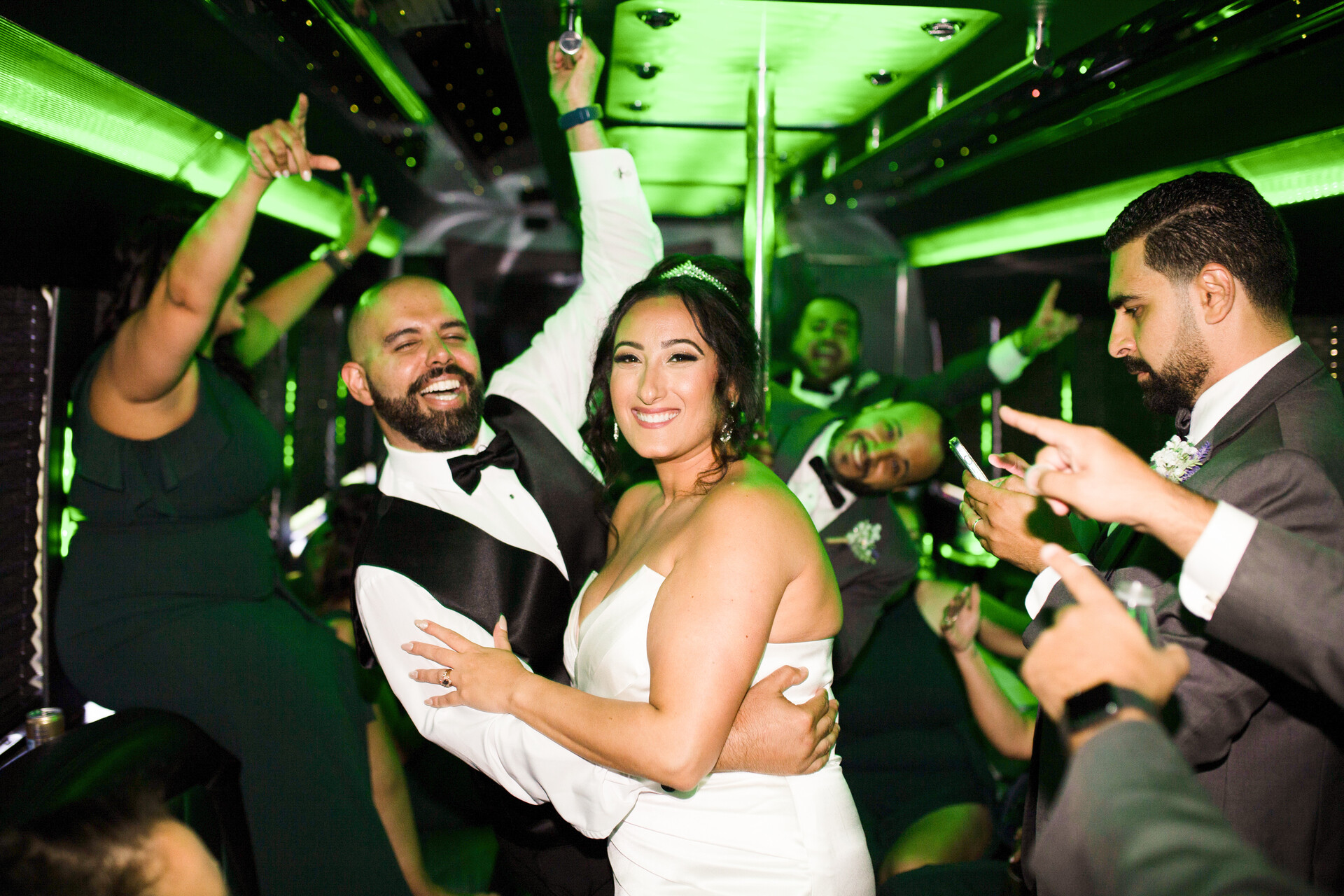 Joyful revelry and vibrant celebration in the wedding party bus with Egyptian music.