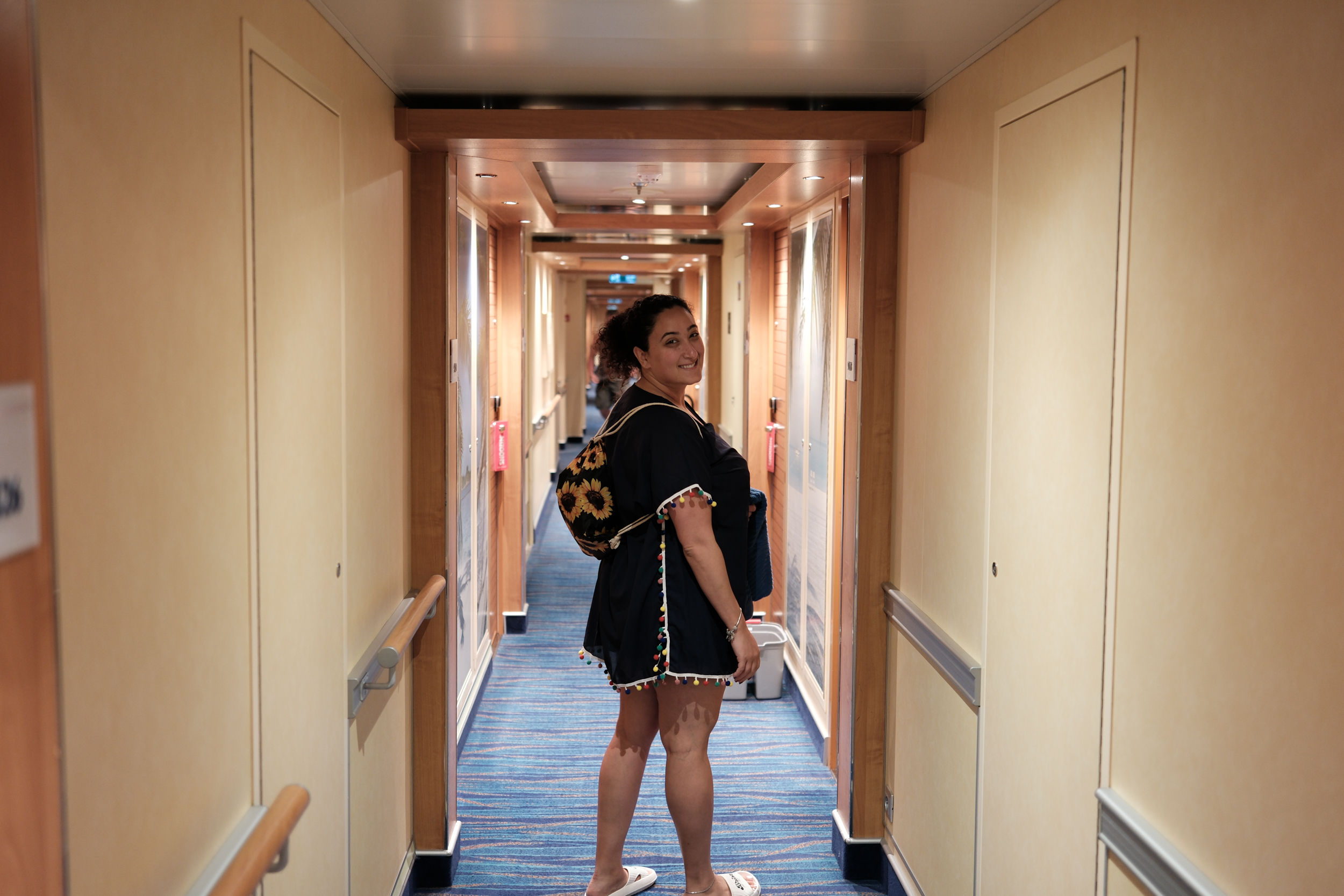 A playful and curious Bunkin' exploring the grand corridors of her cruise ship.