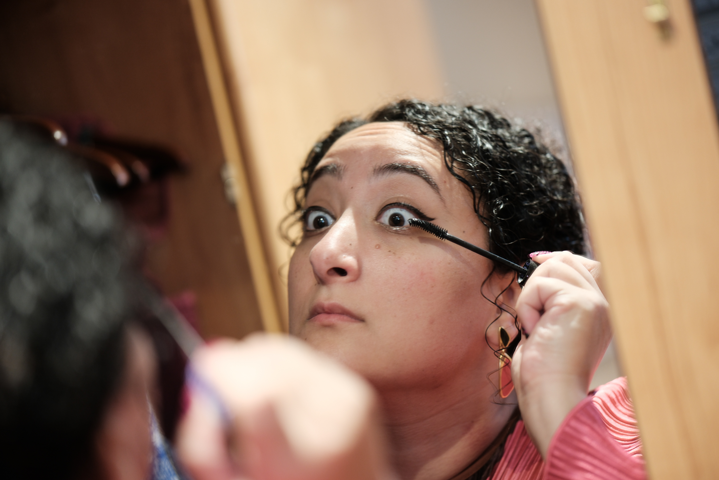 The intense focus and charming humor of Bunkin's pre-adventure makeup ritual.