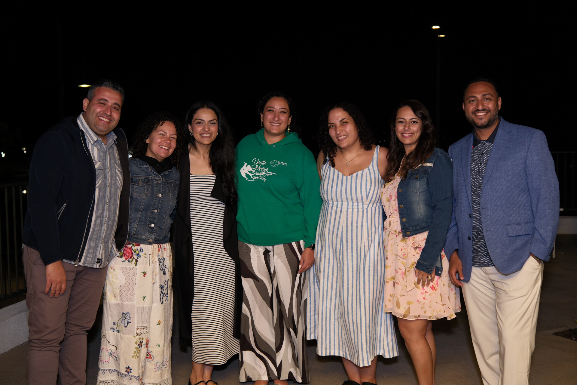 Bunkin' sharing laughter and joy with a vibrant group of friends.