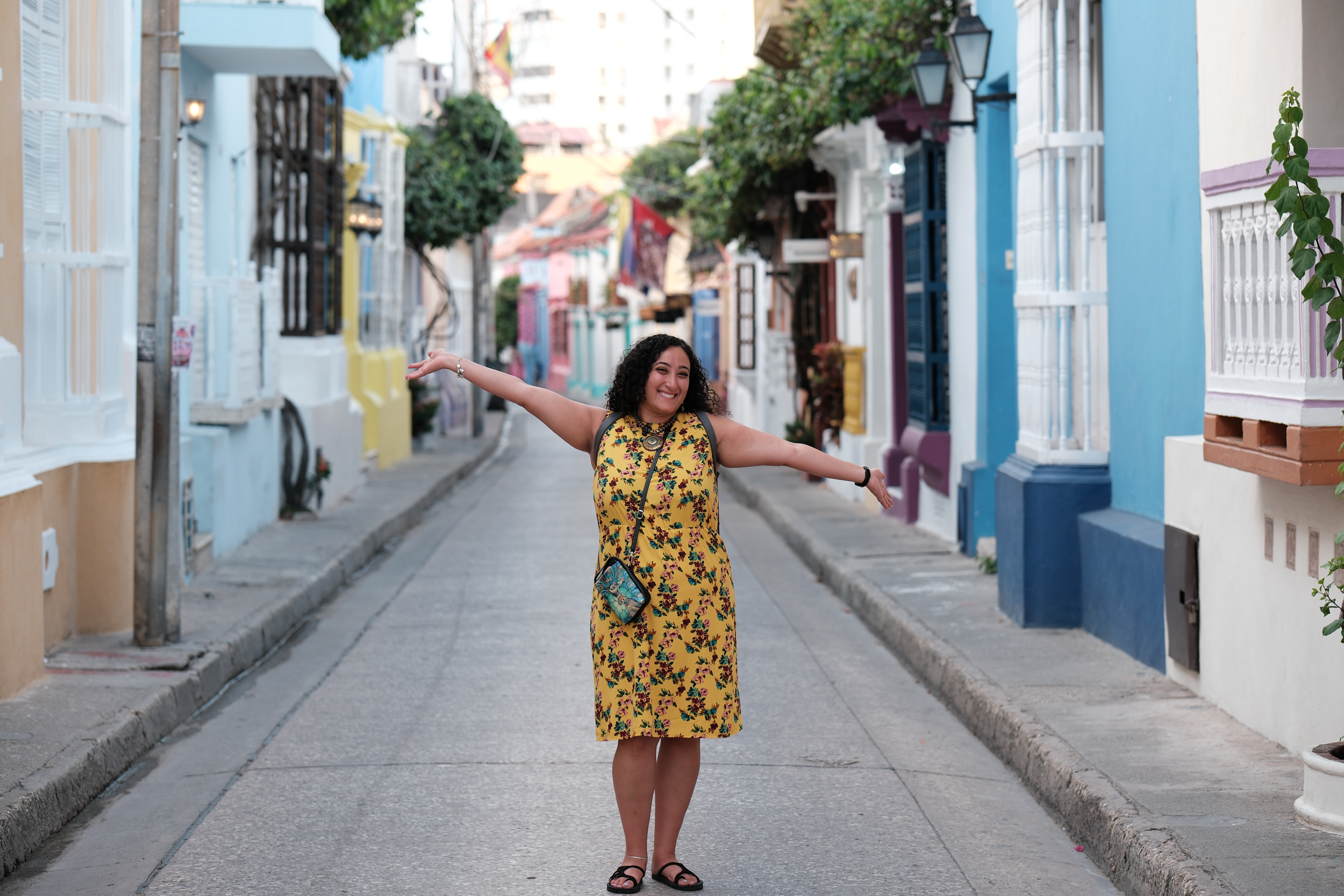 Mighty Bunkin' joyfully embracing the vibrant spirit and captivating life of Cartagena.