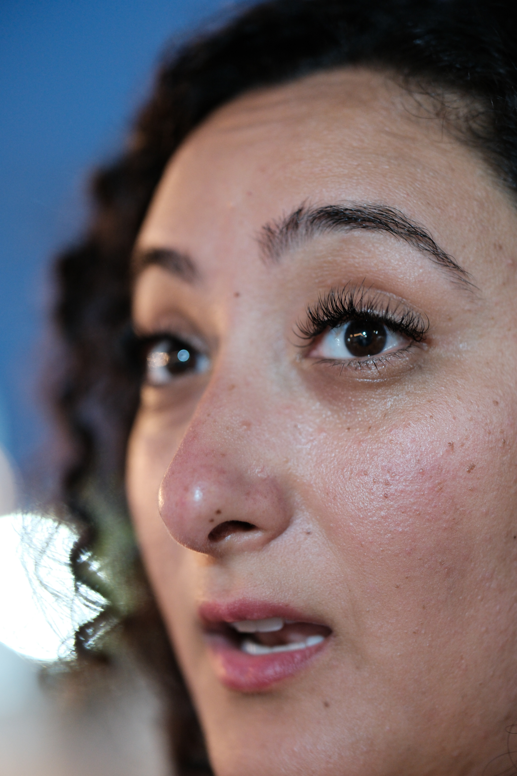 Bunkin' with an expression of delightful surprise.