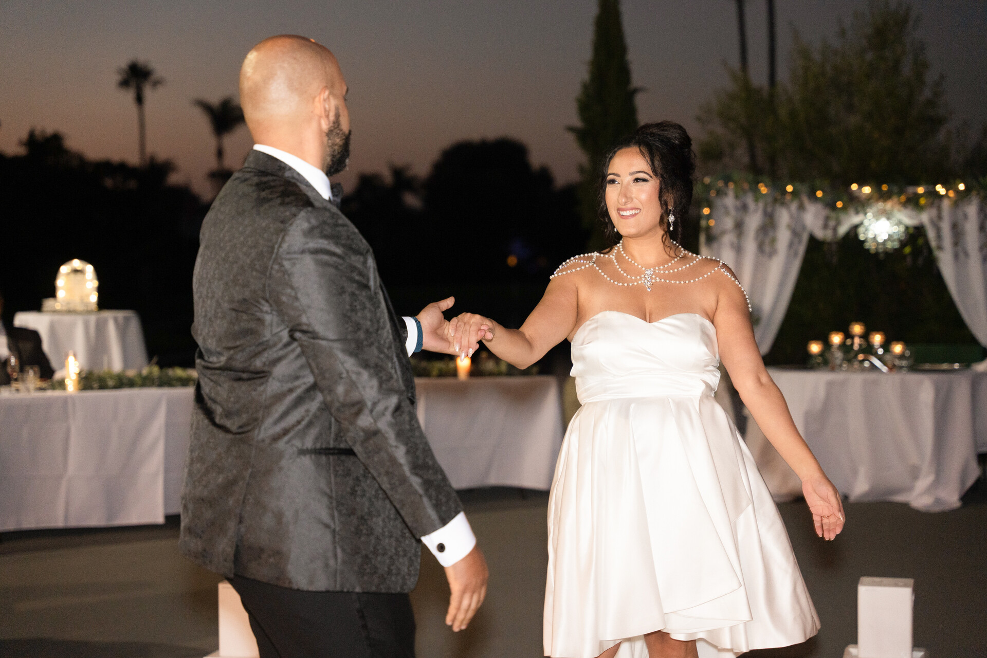 Bunkin' and her husband sharing their romantic and well-rehearsed first dance.