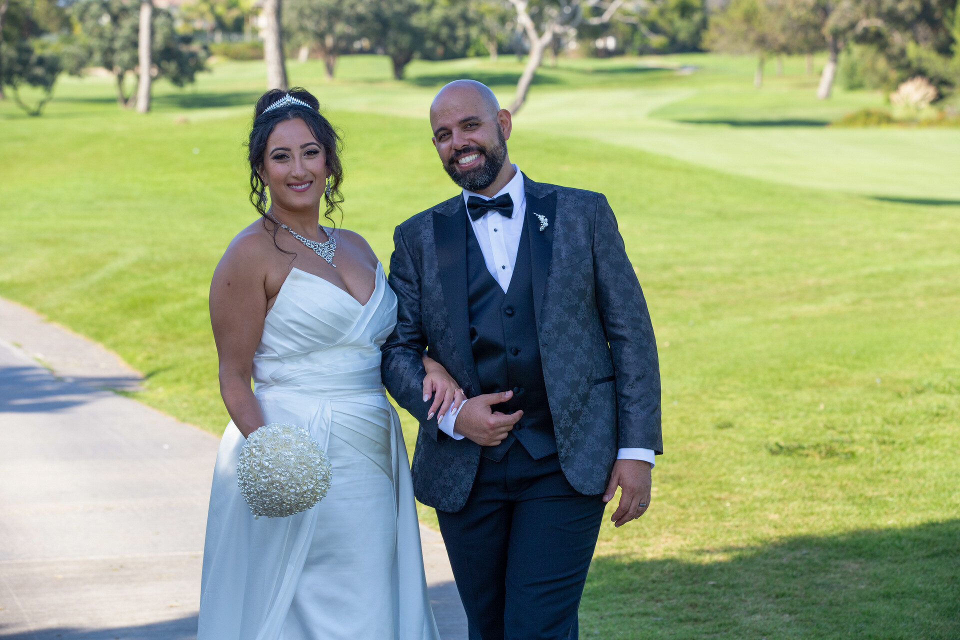 A radiant portrait of the happy royal couple, Bunkin' and her husband, on their wedding day.