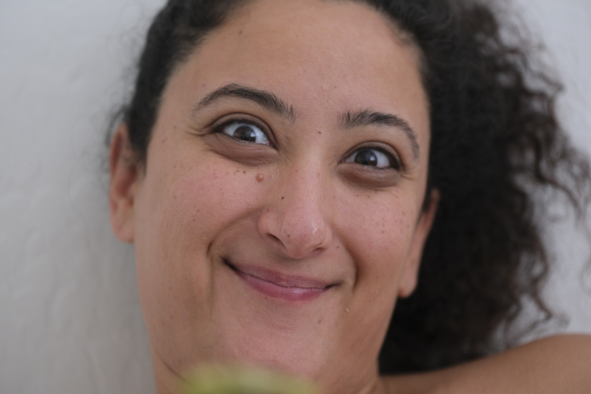 Bunkin' with a playful, wide-eyed expression of amusement.